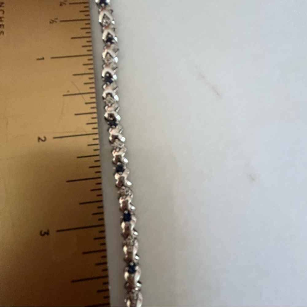 6.5” White Gold Diamond and Sapphire Xs and Os Bracelet